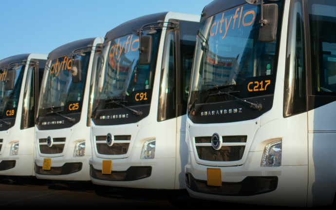 A fleet of reliable, AC benz buses, providing convenient and reliable transportation for some employees at a corporate.