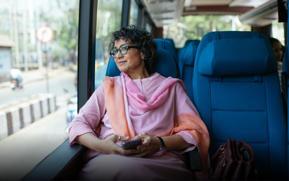 A working professional goint to work in a Cityflo bus.