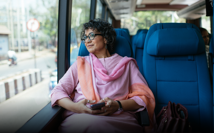 A working professional goint to work in a Cityflo bus.